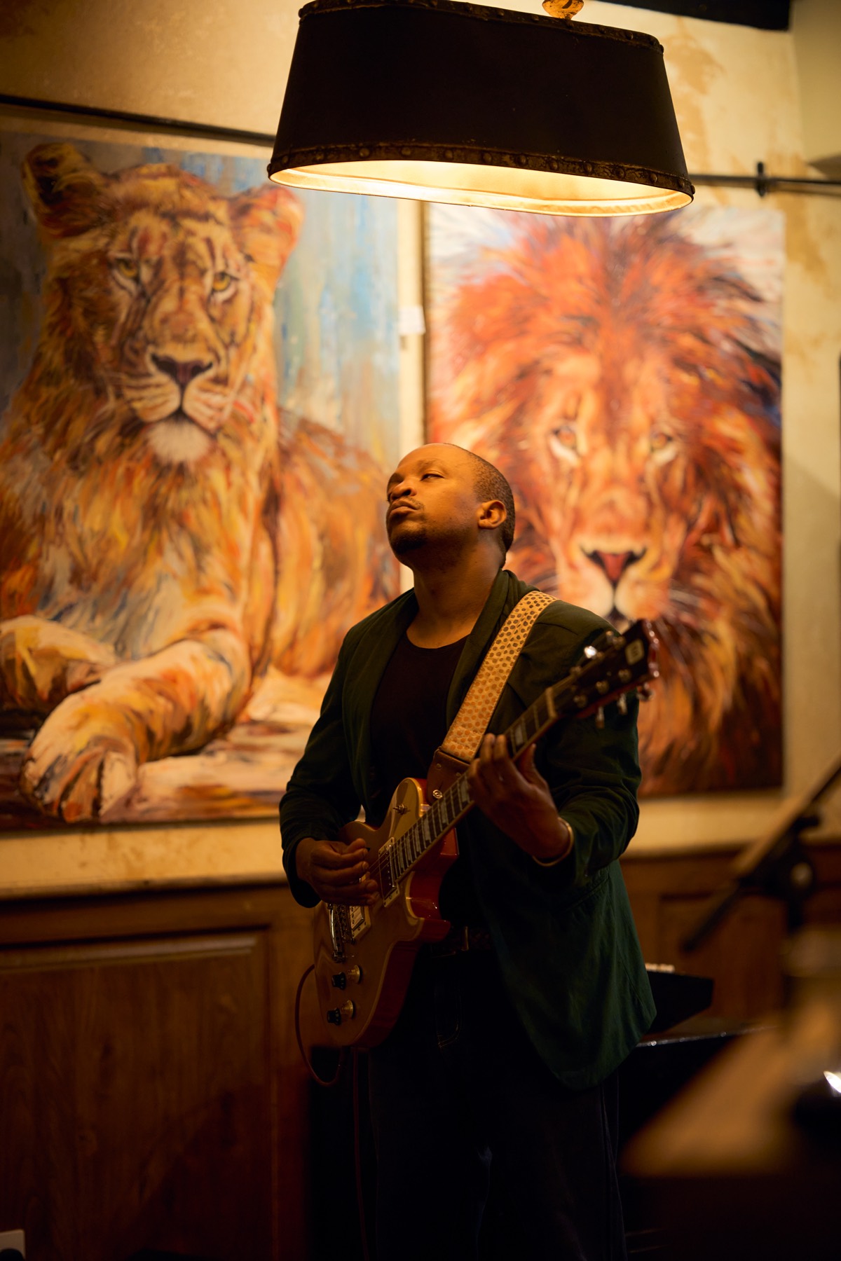 A guitarist playing at Talisman