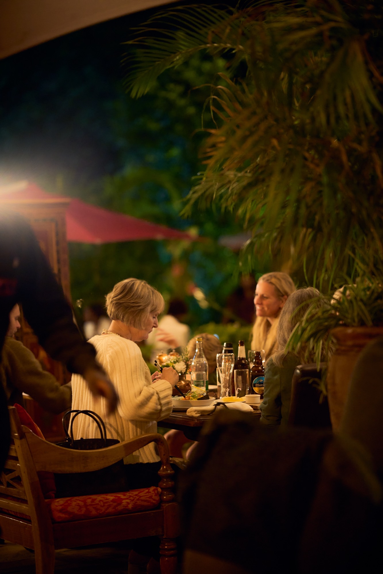 A family at dinner in the Talisman garden