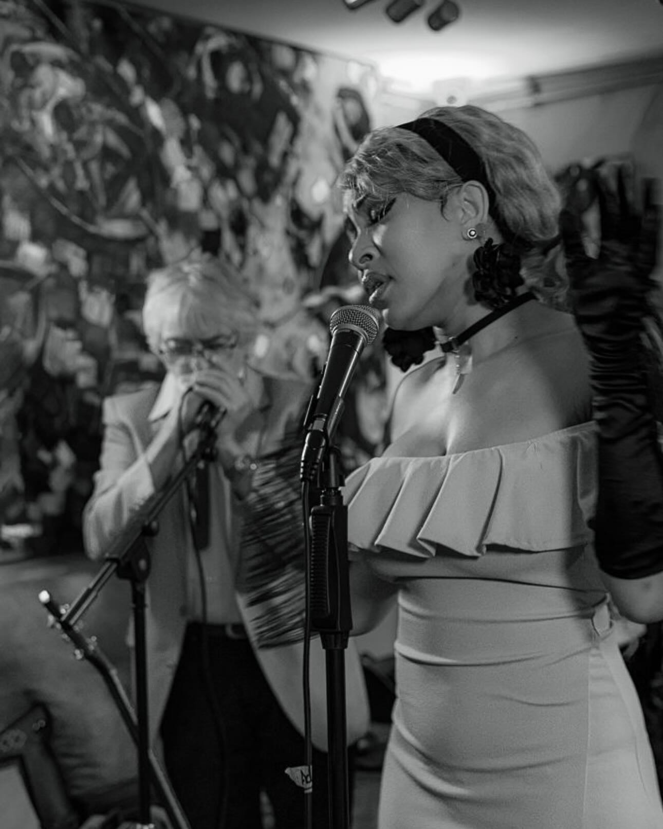 A harmonica player performing at Talisman